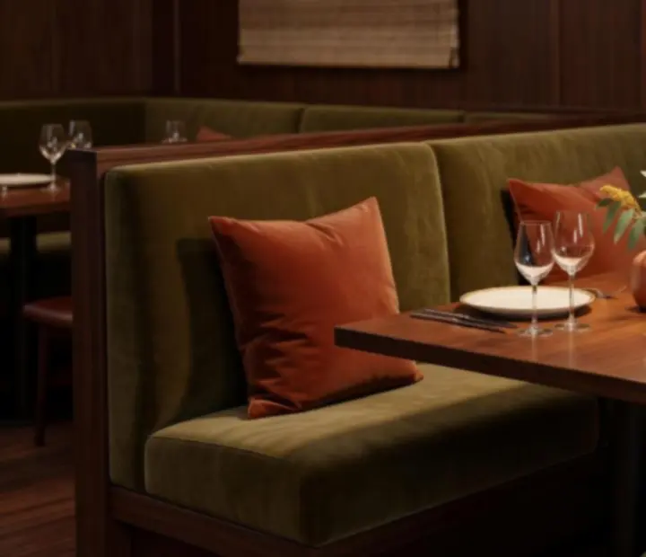 Private booth seating and small tables at ADSIGHT LTD